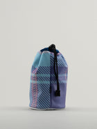 Reverse of blue and pink tartan bag.