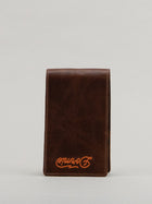 Brown leather yardage book with Dormie embroidery